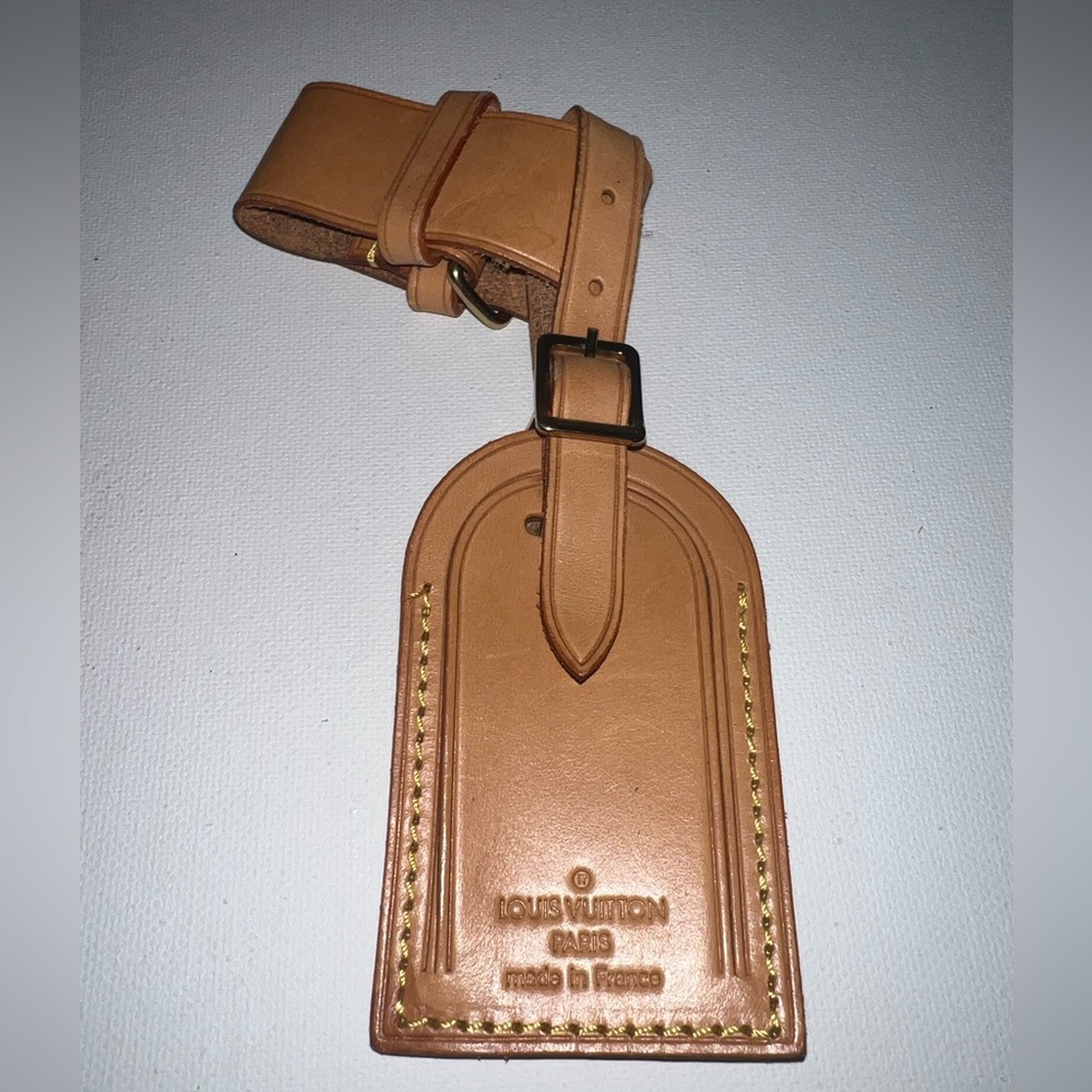 Authentic Louis Vuitton luggage tag and belt